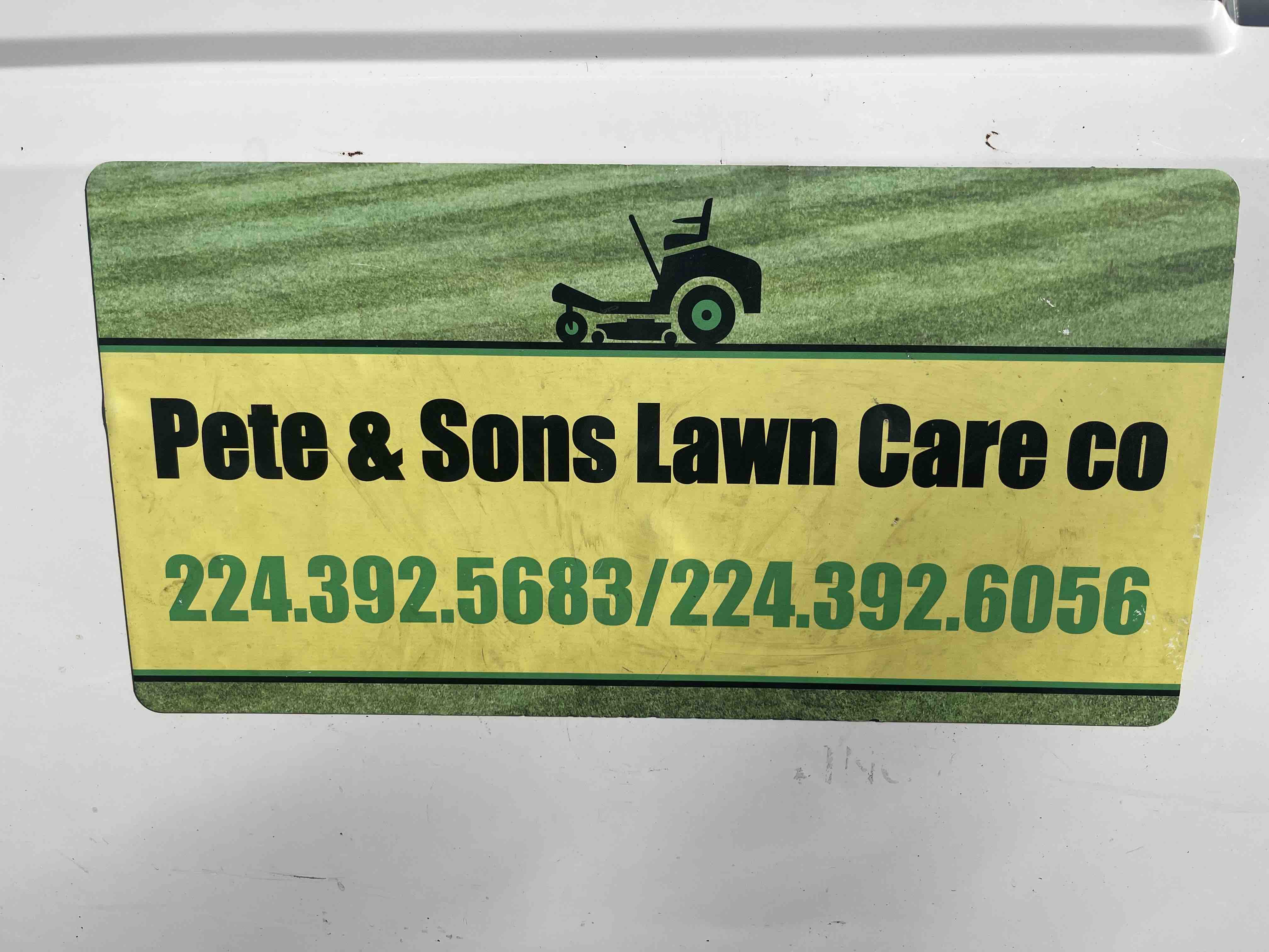 young man side profile having beard trimmed with scissors