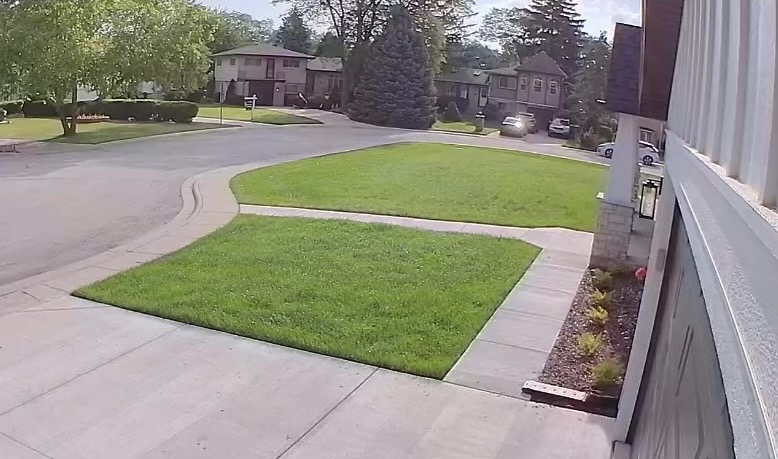 young boy sitting in barbers chair